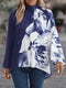 Elegantes Langarmshirt mit Blumenmuster und Stehkragen