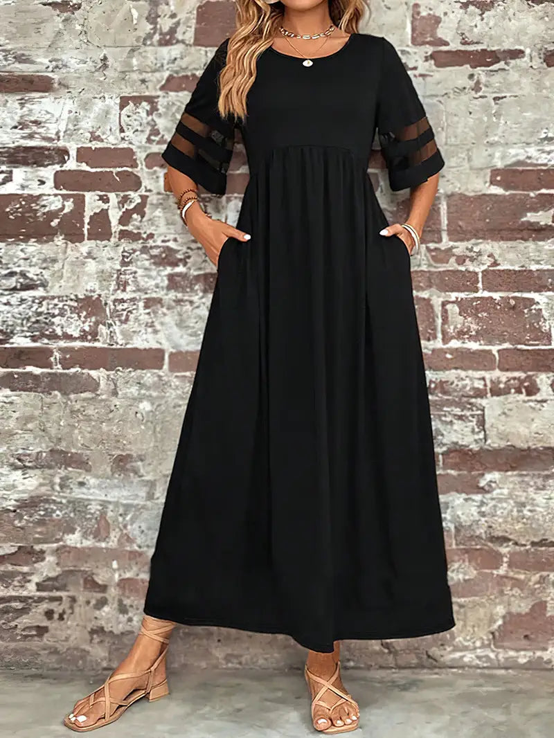 Elegancka sukienka z półrękawkiem i eleganckim ściegiem z siatki