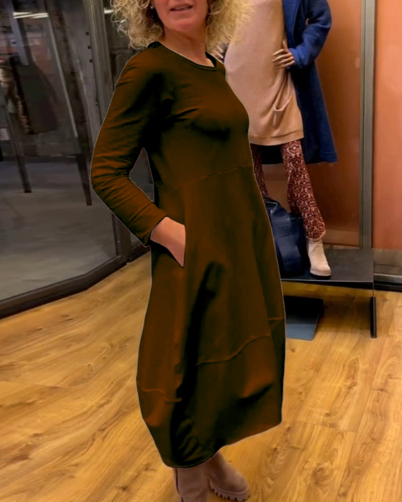 Elegancka czarna sukienka midi Eva™ z praktycznymi kieszeniami
