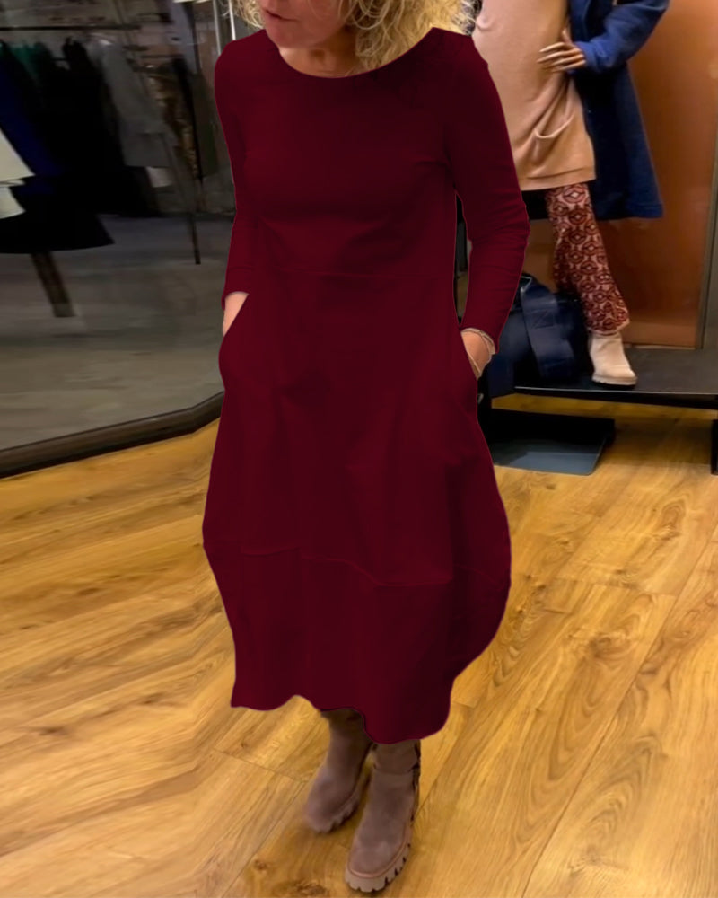 Elegancka czarna sukienka midi Eva™ z praktycznymi kieszeniami
