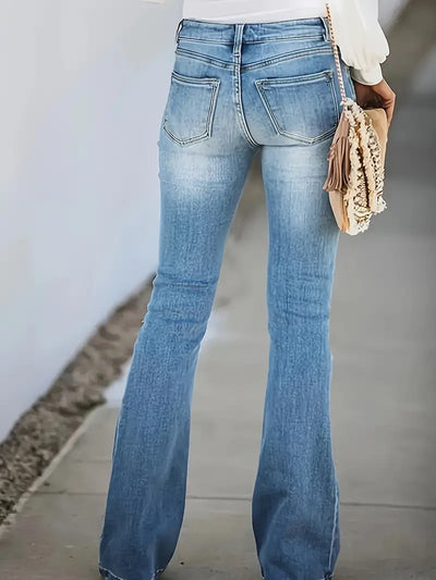 Sprane niebieskie dżinsy retro typu bootcut z wąsami