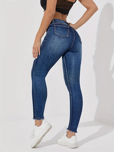 Damskie jeansy skinny z rozciągniętym paskiem i pojedynczym zapięciem