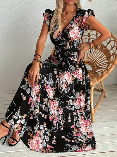 Czarna swingowa sukienka z kwiatowym nadrukiem Elegancka letnia sukienka z falbaną i paskiem