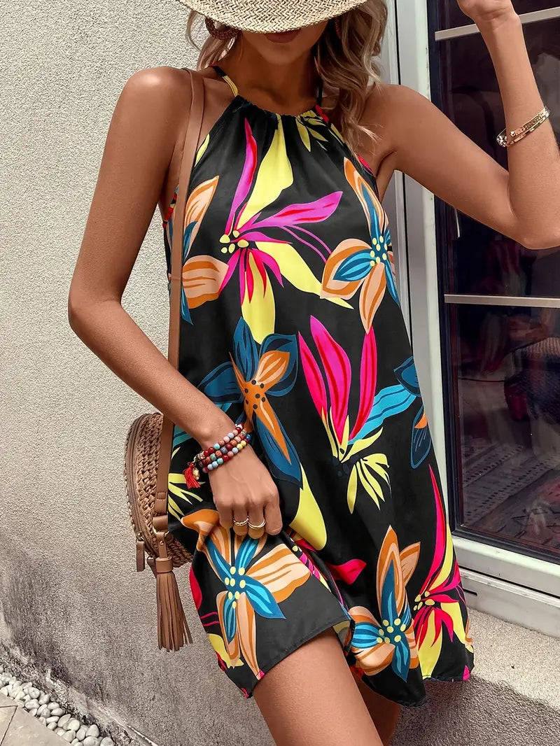 Zomerse Zwarte Jurk met Tropische Bladeren Mouwloos & ElegantLetnia czarna sukienka z tropikalnymi liśćmi bez rękawów i elegancka