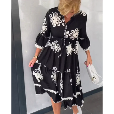 Sukienka w kwiaty Livia™ z eleganckimi rękawami trzy czwarte