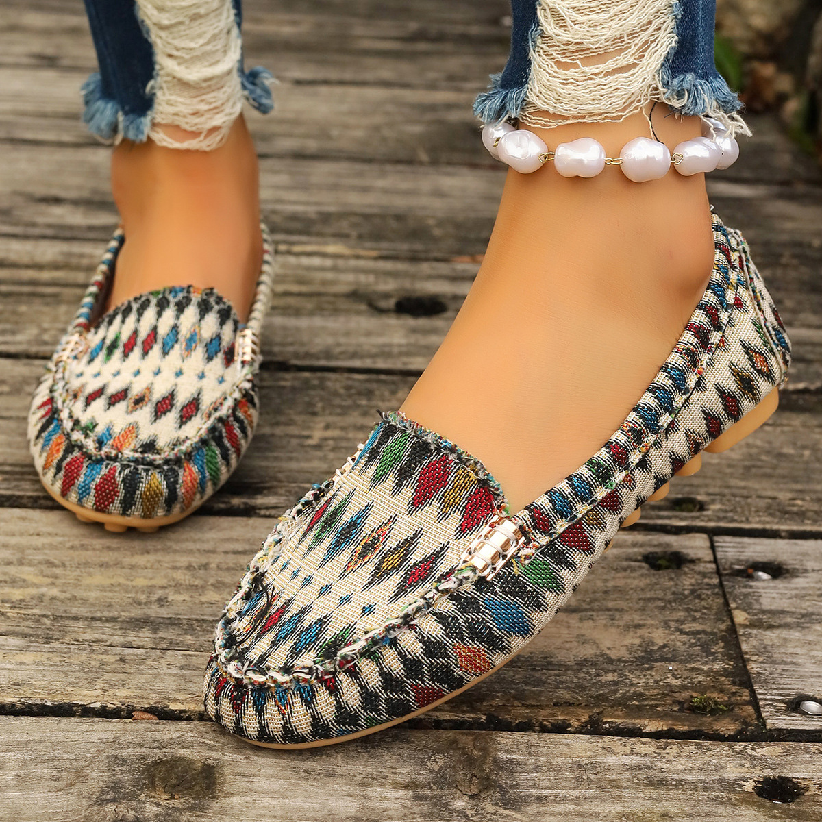Płaskie buty wsuwane z dzianiny z kwiatowym wzorem