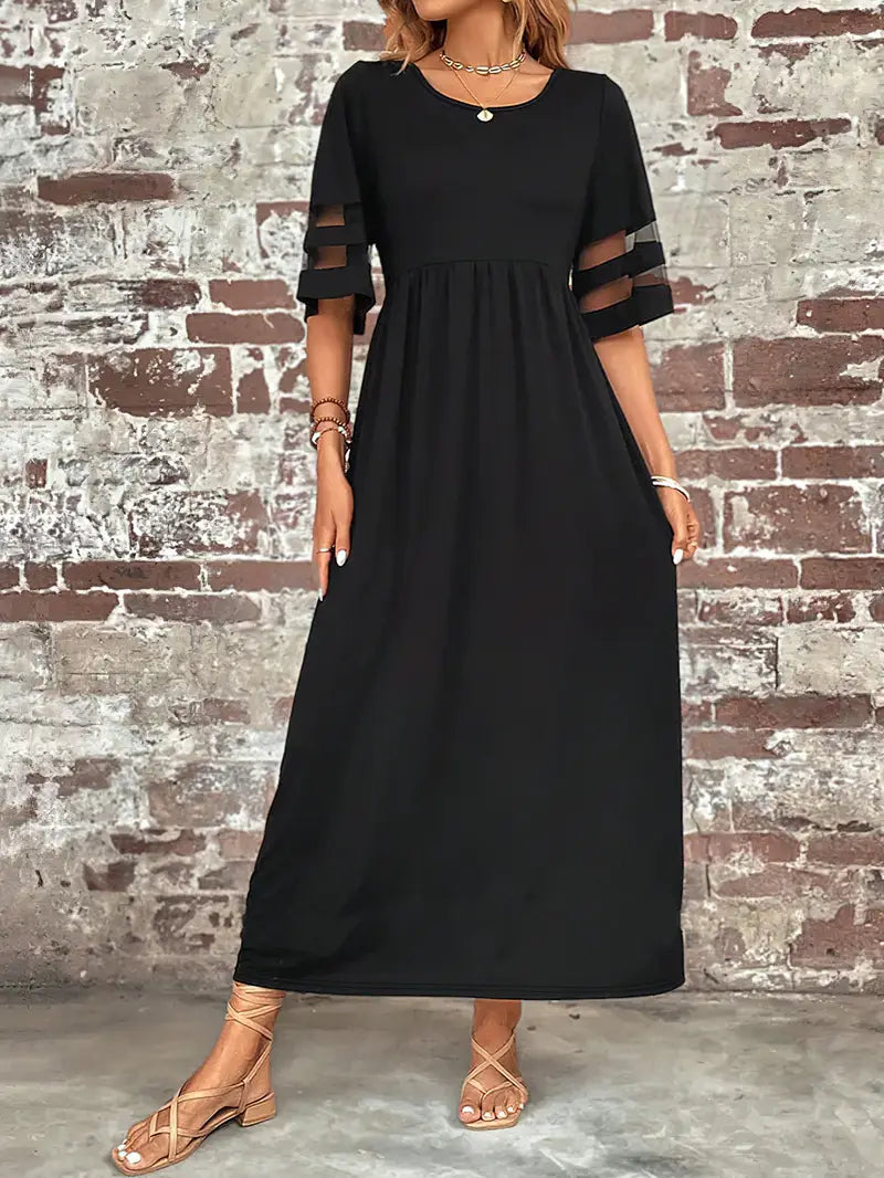 Elegancka sukienka z półrękawkiem i eleganckim ściegiem z siatki
