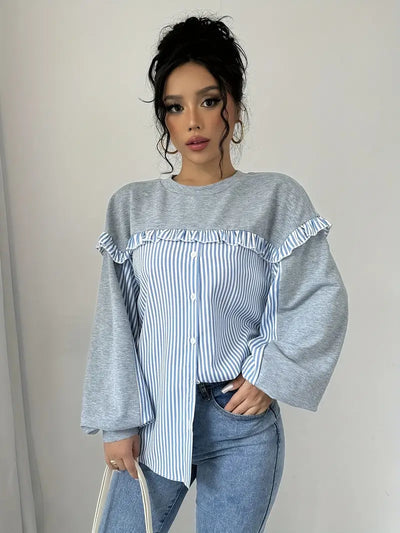Elegancka modna bluza z detalami w paski