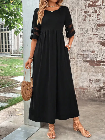 Elegancka sukienka z półrękawkiem i eleganckim ściegiem z siatki