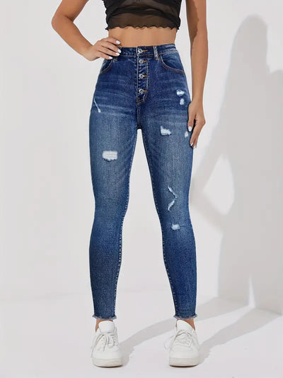 Damskie jeansy skinny z rozciągniętym paskiem i pojedynczym zapięciem