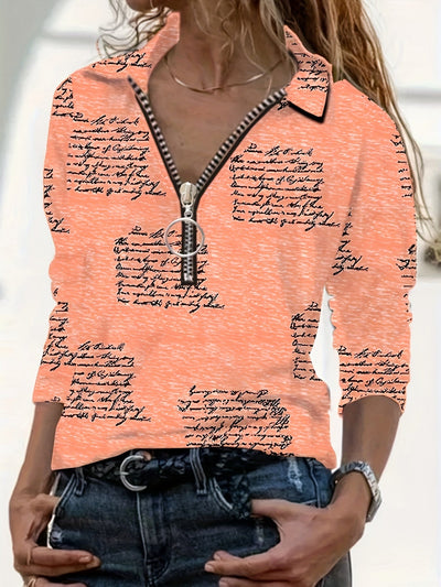 Lniana koszulka polo damska - długi rękaw, wygodna, zapinana na zamek, ze stylowym nadrukiem