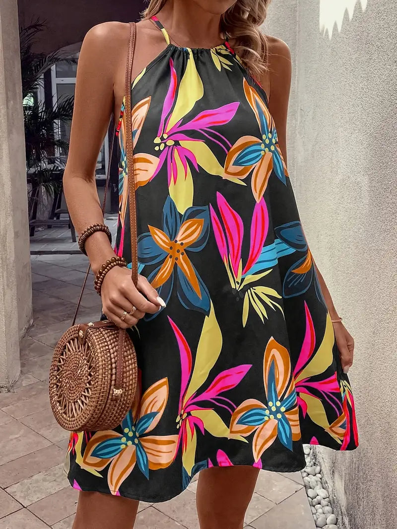Zomerse Zwarte Jurk met Tropische Bladeren Mouwloos & ElegantLetnia czarna sukienka z tropikalnymi liśćmi bez rękawów i elegancka