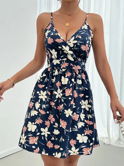 Granatowa sukienka w kwiaty z dekoltem w serek Elegancka sukienka letnia