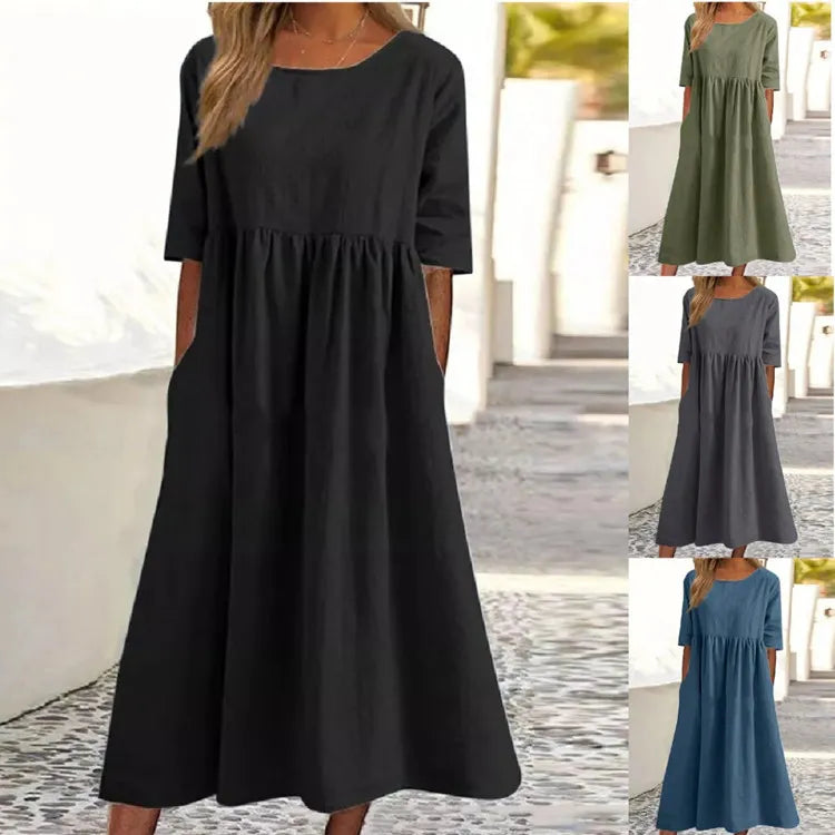 Silvia™ - Elegancka bawełniana sukienka z okrągłym dekoltem i wygodnymi kieszeniami